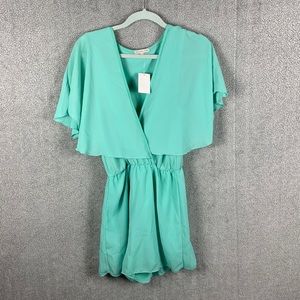 Mint short sleeve romper with tag size medium from Charlotte Russe